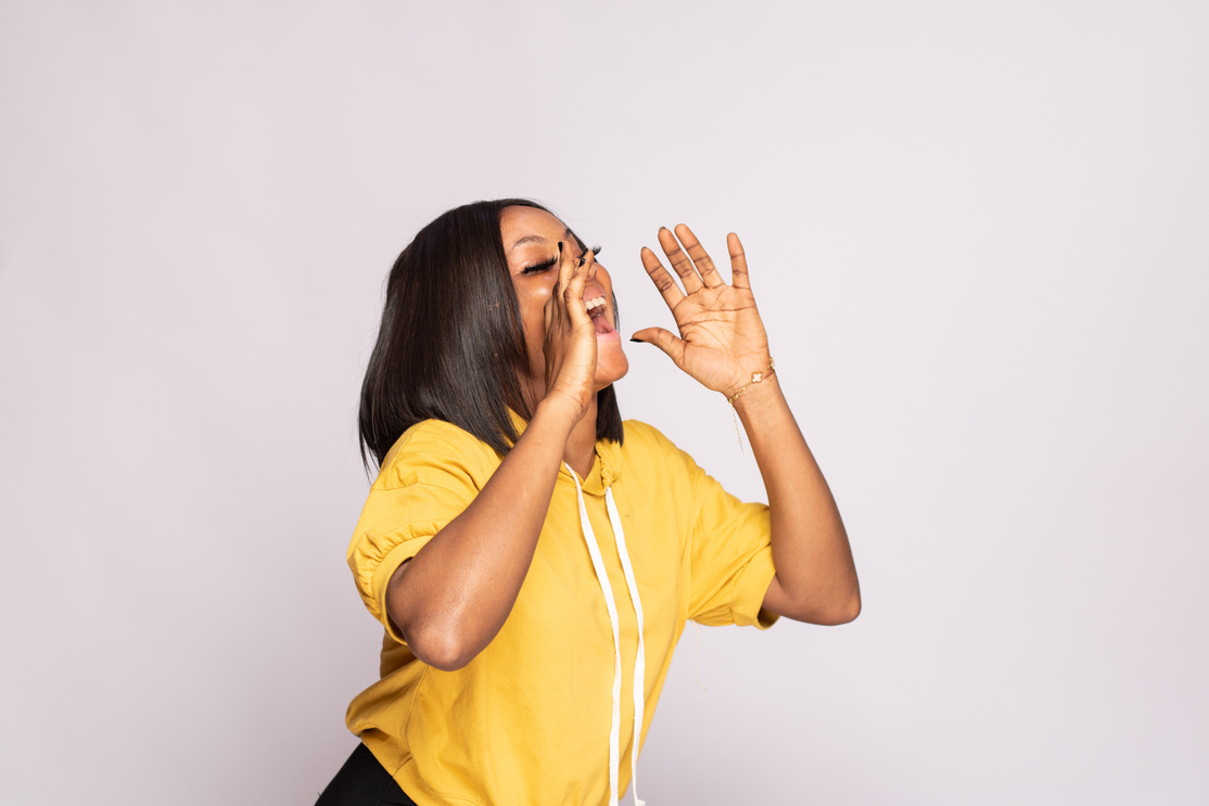 African Lady Screams Excitedly, Advertising Concept
